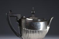 Solid silver tea and coffee service with English hallmarks.