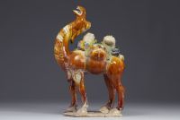 China - Tang-style glazed stoneware camel, unidentified period.