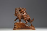 Wooden sculpture from the Black Forest ‘Young boy saved by a dog’, Swiss work from the late 19th century.