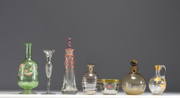 Set of seven pieces of various glassware, vases, carafes, bowls, enamelled and others.