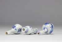 (3) Set of three miniature vases of different shapes in white and blue from the Kangxi period (1661-1722)