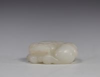 China - White jade carved with Shi Shi decoration, Qing period.