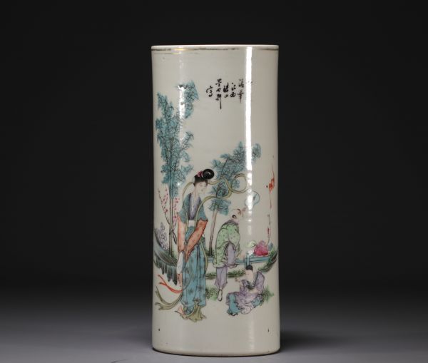 China - Famille rose porcelain brush-holder decorated with figures.