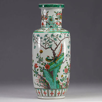 China - A green family porcelain vase decorated with trees and birds, early 20th century.