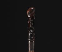 RDC - Tchokwé spatula surmounted by a carved figure.