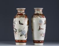 Japan - Pair of Satsuma porcelain vases with floral and butterfly decoration, Meiji period.