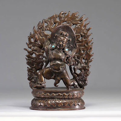 Large sculpture of a Tibetan divinity in bronze inlaid with turquoise, 18th century