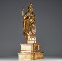 “Saint Florian” Sculpture en bois stuqué doré, sur socle, époque XVIIIe siècle.