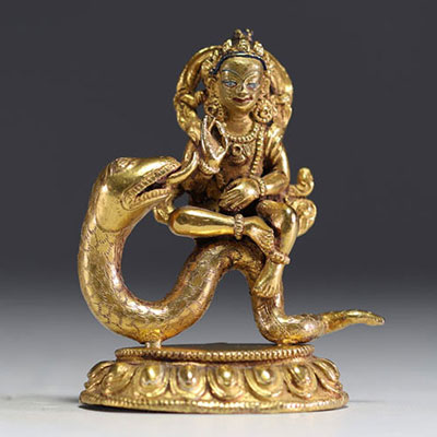 Chine - Tibet - Vidyadhara, sculpture en bronze doré aux yeux polychromes.