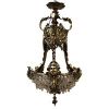 Hot-air balloon chandelier, bronze frame decorated with cherub faces, glass beads, 19th century.