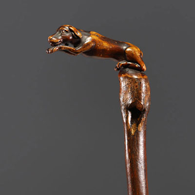 Art Populaire - Carved wooden cane with a dog motif.