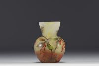 DAUM Nancy - Small vase in enamelled marbled glass decorated with small berries, signed.