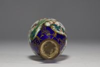 Japan - Blue cloisonné enamel vase with floral design on a white background.