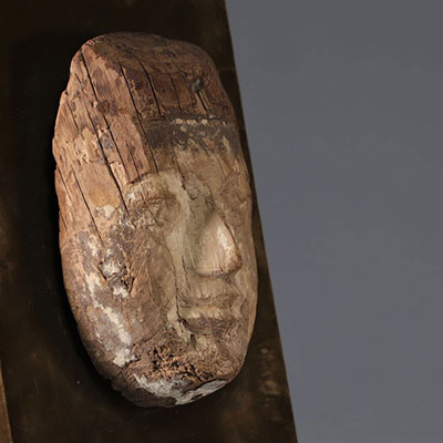 Large wooden sarcophagus mask with traces of black pigment and white slip from Egypt, Late Period - Ptolemaic period, 664-30 BC.