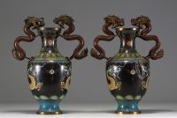 China - Pair of cloisonné vases, handles and body decorated with dragons.