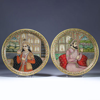 Pair of marble medallions painted with figures India