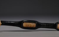 China - Dark green hardstone and carved jade Ruyi scepter with dignitary design, signed on the back.
