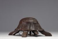 Wooden billiard spittoon in the shape of a turtle, late 19th century.