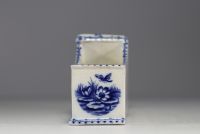 White-blue porcelain planter with floral and bird decoration in cartridge.