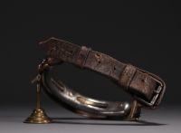 Rare leather dog collar with bronze choke system and steel nails, 19th century.