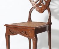 Émile GALLÉ (1846 - 1904) ‘Ombelles’ model Exceptional pair of solid walnut chairs, circa 1903-1904