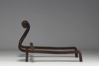 Raymond SUBES (1891-1970) attr. à - Pair of wrought iron andirons, circa 1930.