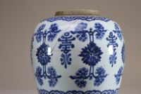 China - Pair of white-blue porcelain covered potiches, circle mark under the piece.