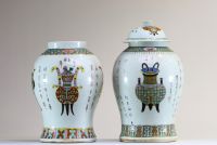 China - Pair of pink family polychrome porcelain vases with antique furniture decoration, 19th century.