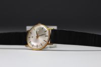 Tissot Visodate - Men's watch with 18k gold case, mechanical.