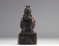 Bronze statue of a traditional figure with dark patinas and traces of gilding from Ming period China (明朝)