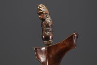 Malaysia/Indonesia - Kriss (Keris) handle in the form of a carved wooden divinity, wooden scabbard, 19th century.