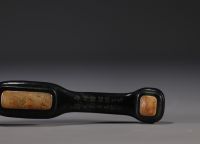 China - Dark green hardstone and carved jade Ruyi scepter with dignitary design, signed on the back.