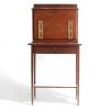 Petit bureau de style néo-shératon en acajou et bronze, vers 1930.