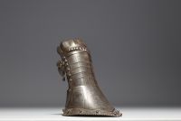 Wrought iron armour gauntlet finely engraved with foliage, Italy, 16th century.