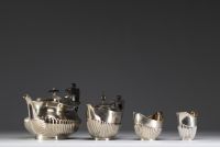 Solid silver tea and coffee service with English hallmarks.