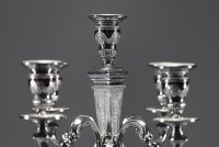 Pair of solid silver candlesticks, five points of light, hallmarks (three diamonds) on the base.