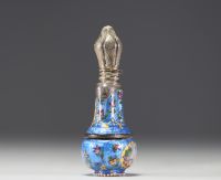 A rare silver and guilloché enamel salt flask decorated with flowers and landscape scenes, 19th century.