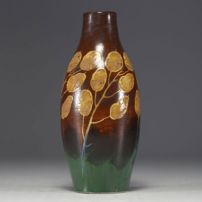 Charles CATTEAU (1880-1966) KERAMIS - Vase en grès émaillé au décor de monnaies du Pape sur fond brun et vert, signé.