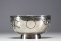 China - Large solid silver bowl decorated with dragons in relief.