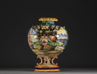 Albarello majolica urn vase decorated with antique scenes.