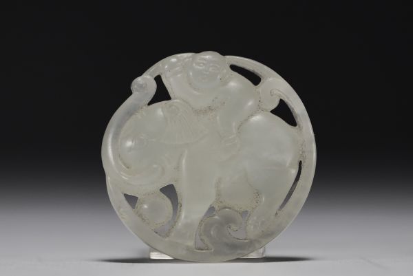 China - White jade plaque decorated with a figure riding an elephant, QING dynasty (1644-1911).