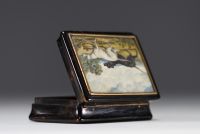 Rare tortoiseshell snuffbox with miniature hunting dogs and gold surround.