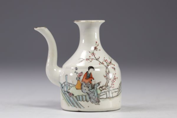 China - Famille rose porcelain teapot decorated with characters.