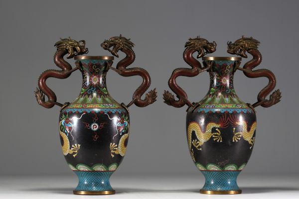 China - Pair of cloisonné vases, handles and body decorated with dragons.