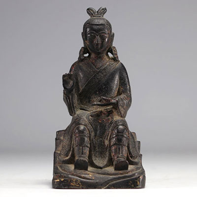 Bronze statue of a traditional figure with dark patinas and traces of gilding from Ming period China (明朝)