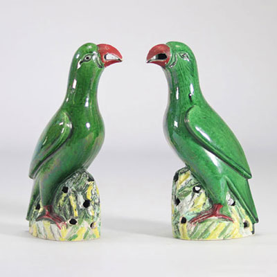 Pair of green glazed 'parrot' birds from China from the 19th century