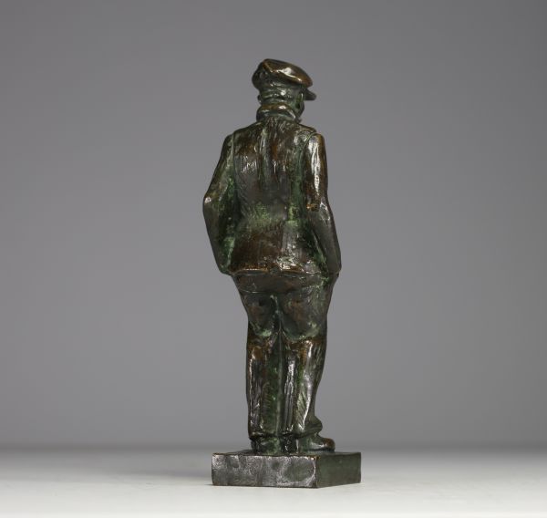 F. GOSSÉ (XIX-XX) ‘Les mains dans les poches’ Sculpture in bronze with green patina, 20th century.