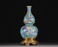 China - Porcelain double gourd vase with figures, gilt bronze mounting, Qing period.