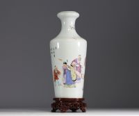 China - Famille rose porcelain vase decorated with magi and poem.