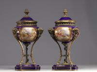 Pair of Sèvres porcelain cassolettes decorated with gallant scenes, mounted on bronze.